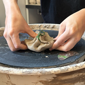 Fold color into clay